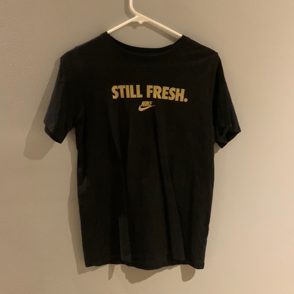 Black and gold Nike tee